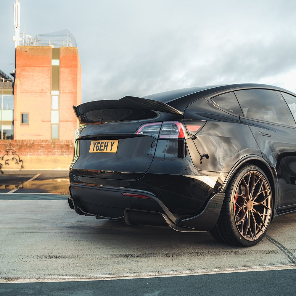 Tesla Model Y MK1 2020-2025 carbon fibre full kit by CT Carbon, featuring sleek, lightweight carbon fibre components for vehicle enhancement.