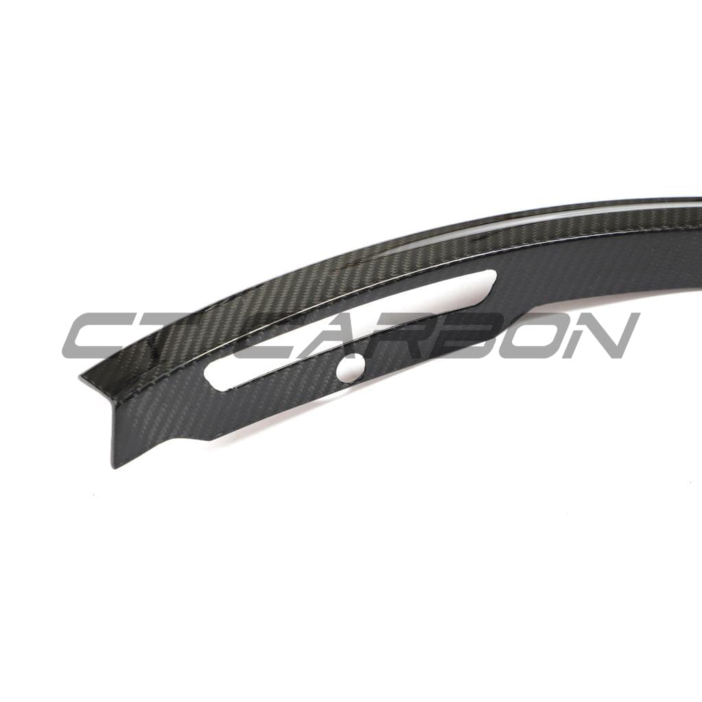 Tesla Model Y MK1 2020-2025 carbon fibre full kit by CT Carbon, shown on a sleek vehicle with carbon fibre accents.