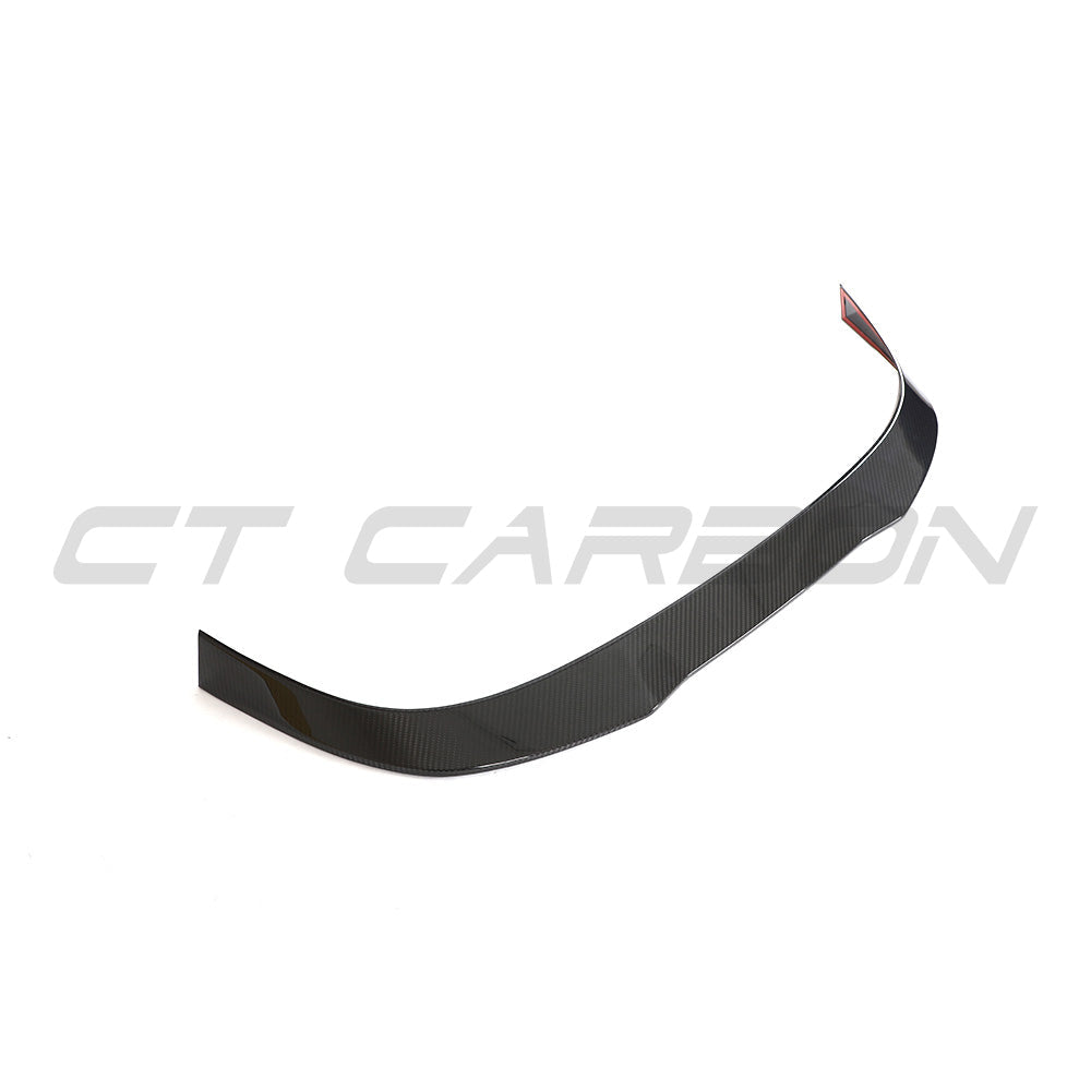 VW Golf MK8 CS carbon fibre spoiler by CT Design, shown installed on the car's rear, highlighting its sleek, aerodynamic profile.