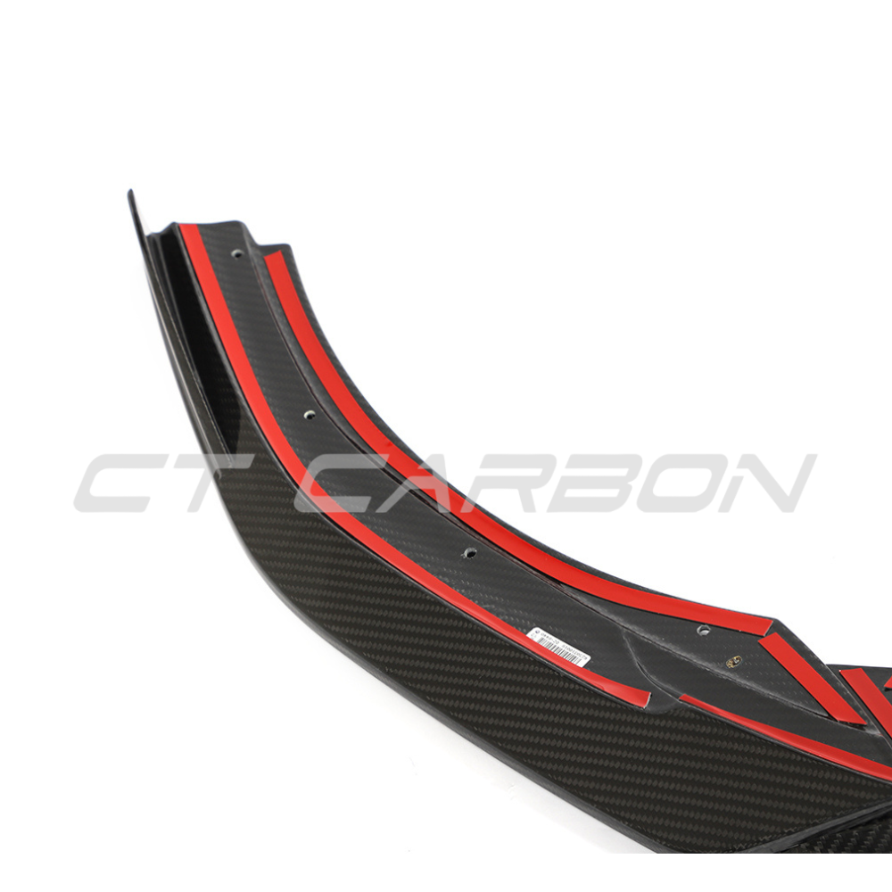 VW Golf MK8 R carbon fiber splitter by CT Design, showcasing its sleek, aerodynamic front splitter with detailed carbon fiber weave.