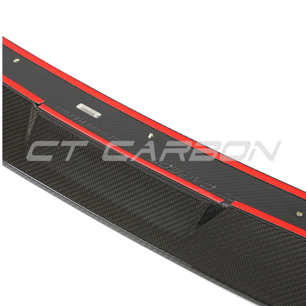 VW Golf MK8 R carbon fiber splitter by CT Design, featuring sleek aerodynamic design and textured carbon fiber finish.