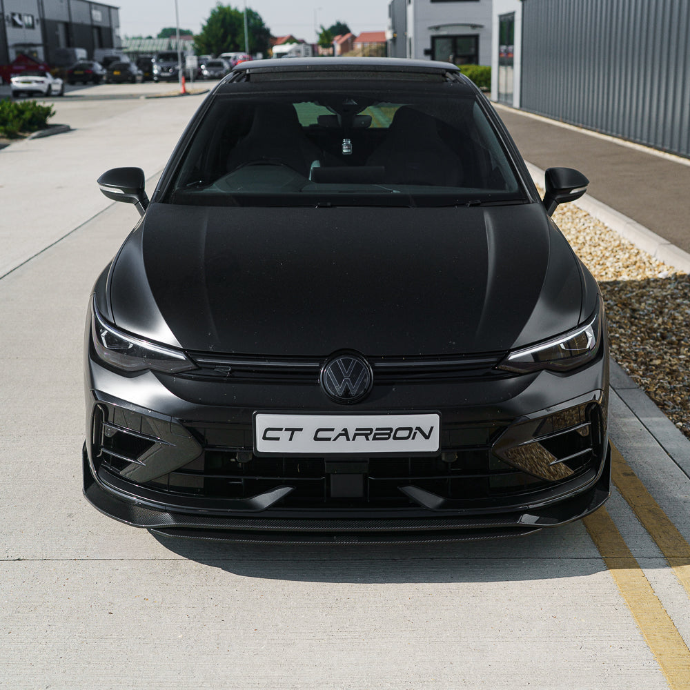 Satin black carbon fiber splitter for VW Golf MK8.5 R 2024+ by CT Carbon, showing close-up of sleek aerodynamic design.