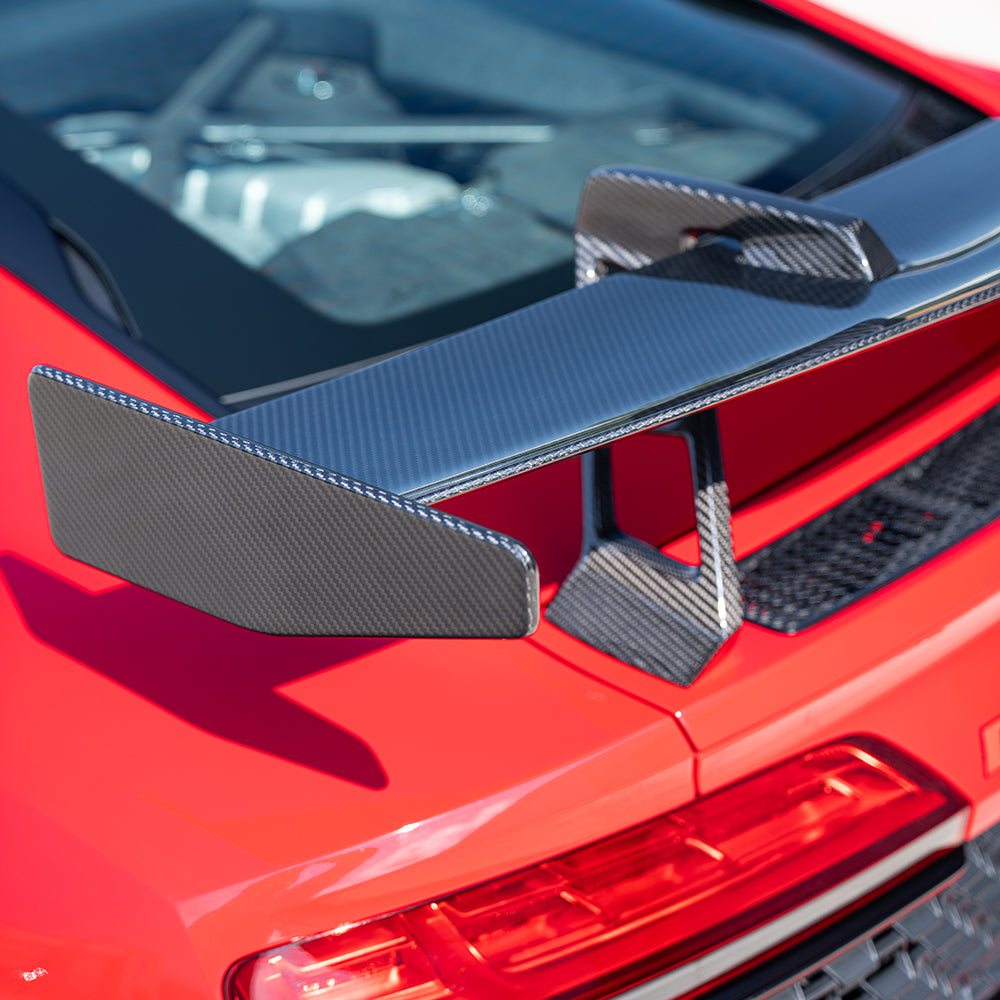 Audi R8 V10 Gen 2.5 CT Carbon fiber full kit including front splitter, side skirts, and rear diffuser with carbon fiber finish.