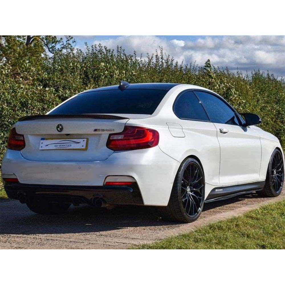 BMW 2 Series F22 CT Carbon gloss black full kit with dual exhaust, featuring MP style design on a sleek black car.