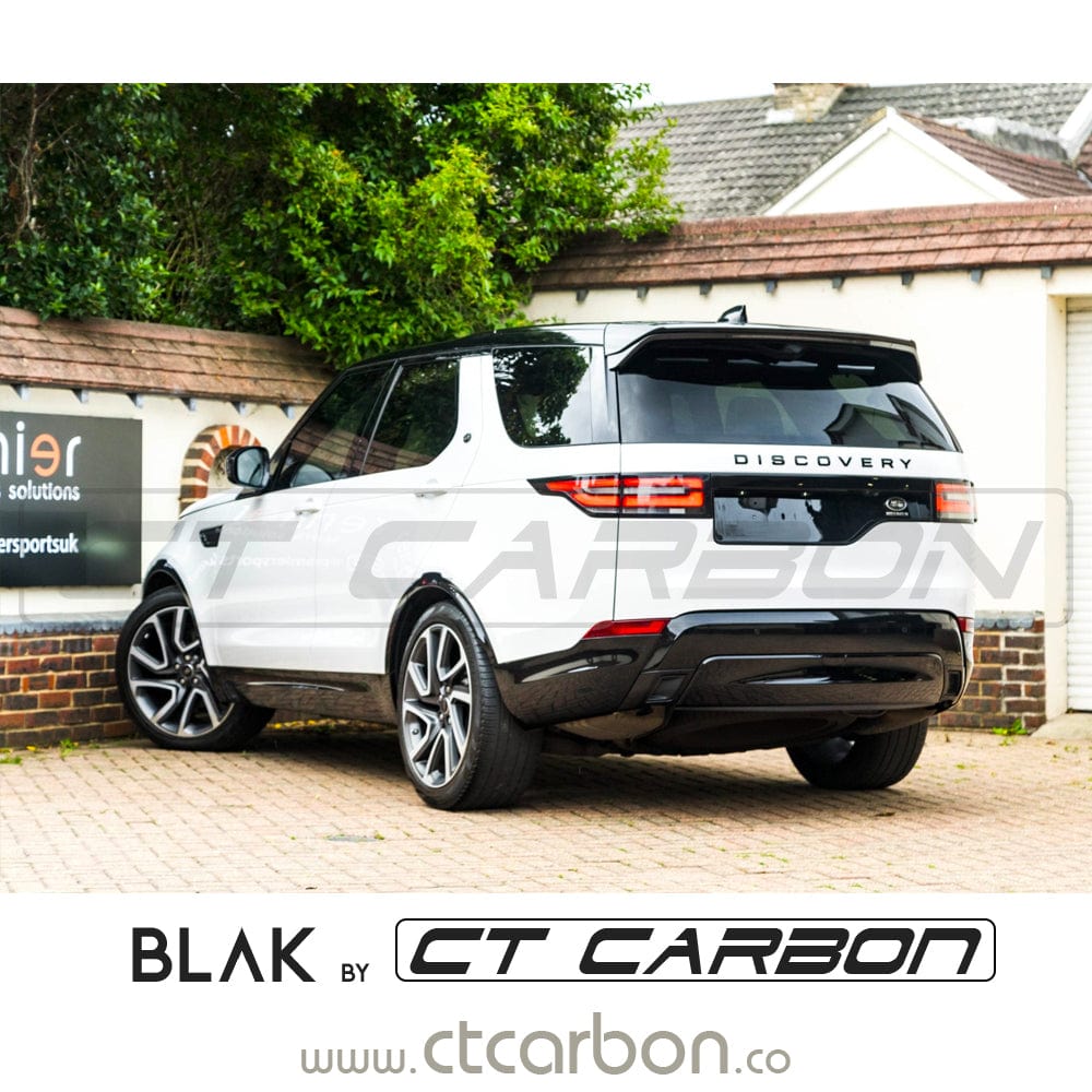Full black edition Land Rover Discovery 5 trim kit by CT Carbon, featuring sleek black exterior accents and detailing.