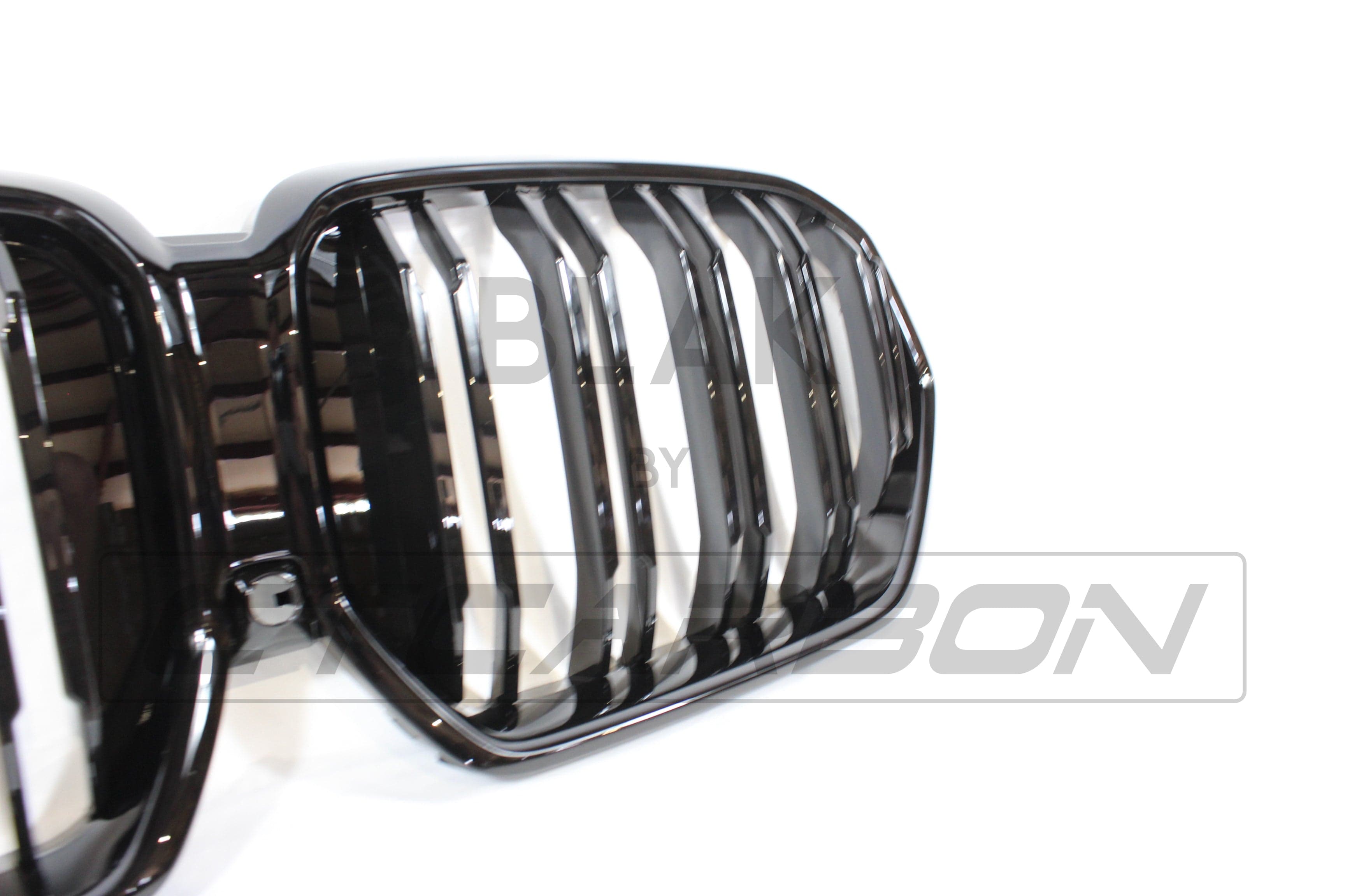 BMW G06 X6 2019-2023 double slat black grille by CT Carbon, featuring sleek black slats for a stylish exterior upgrade.