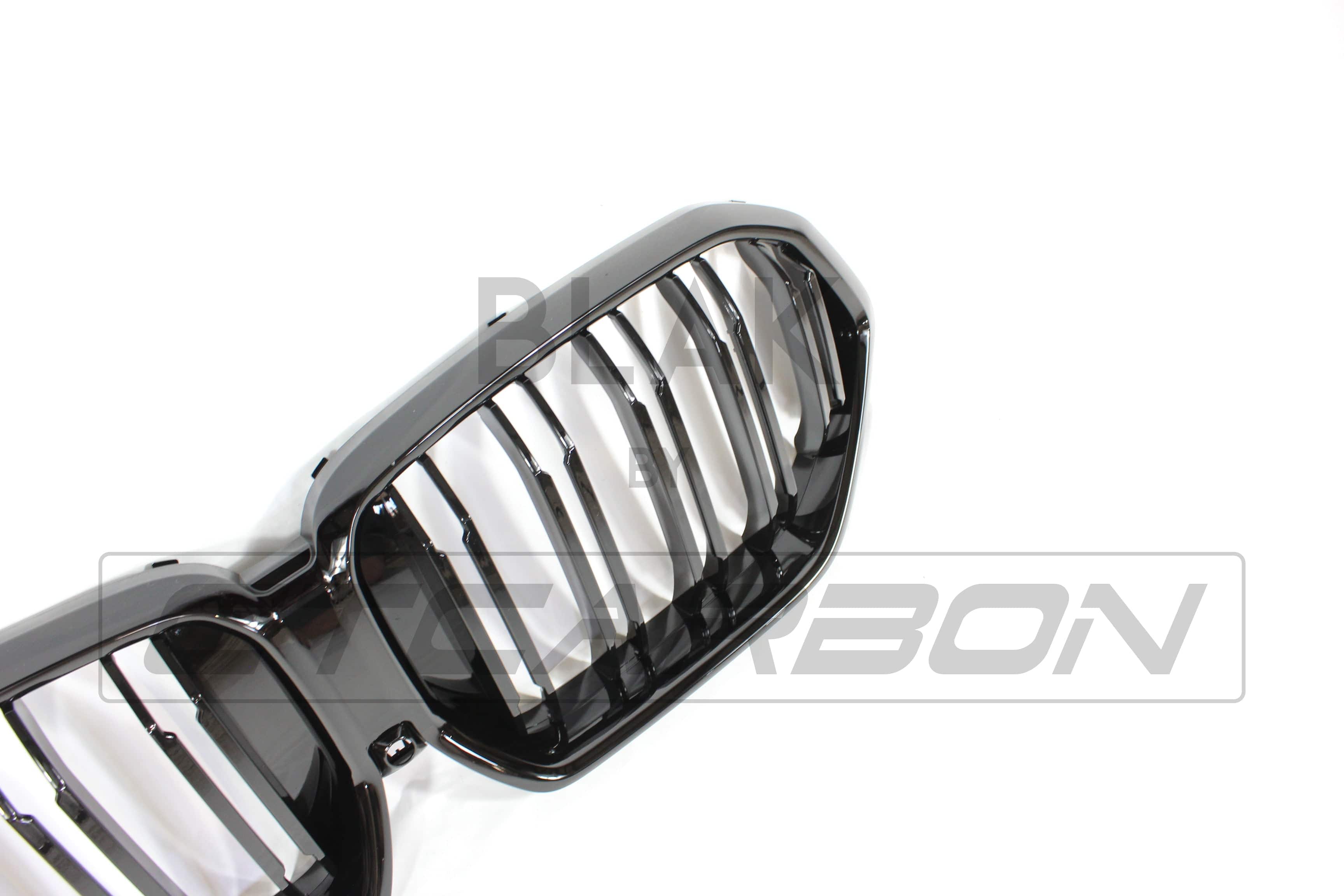 BMW G06 X6 2019-2023 double slat black grille by CT Carbon, close-up view of sleek black grille design.