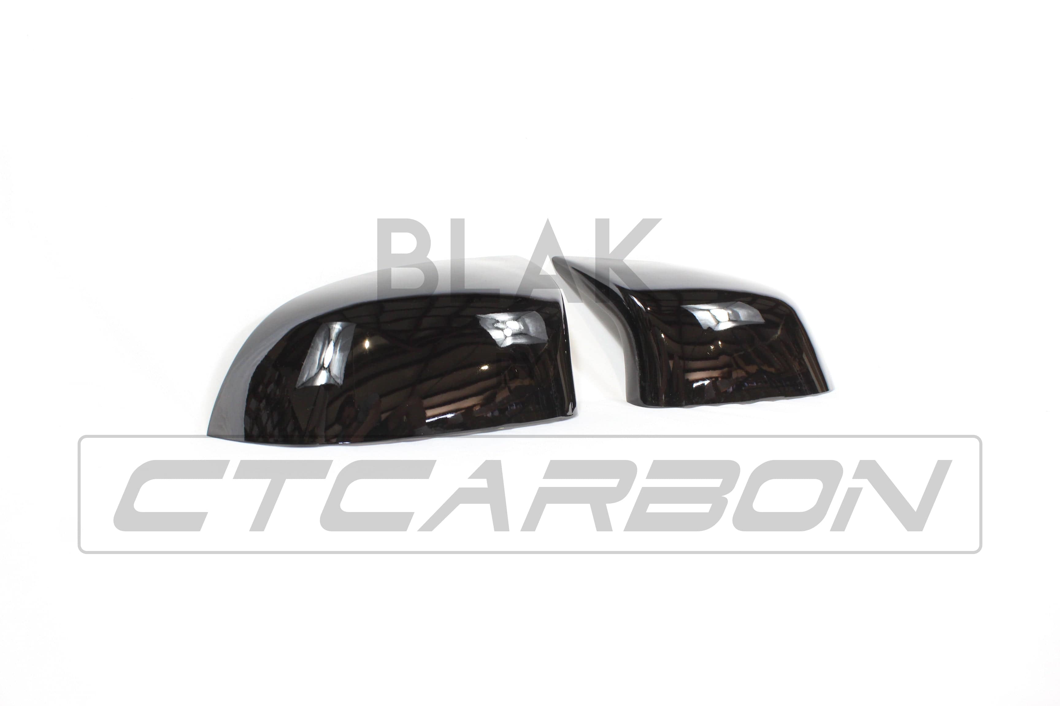 Gloss black mirror replacements for BMW F15/F16 X5/X6 by CT Carbon, showcasing sleek, high-quality exterior accessories.