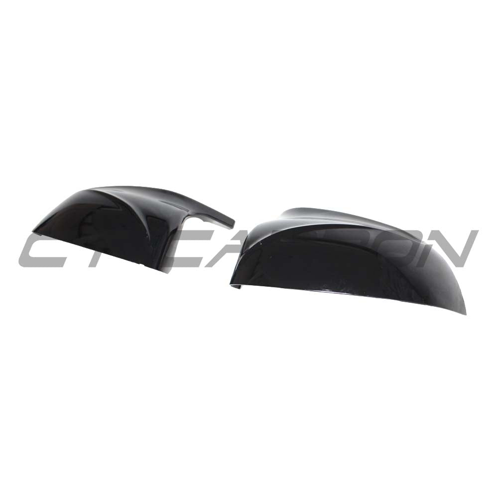 Gloss black BMW X3, X4, X5, X6 G01, G02, G05, G06 mirrors by CT Carbon, showing sleek side mirror assemblies.