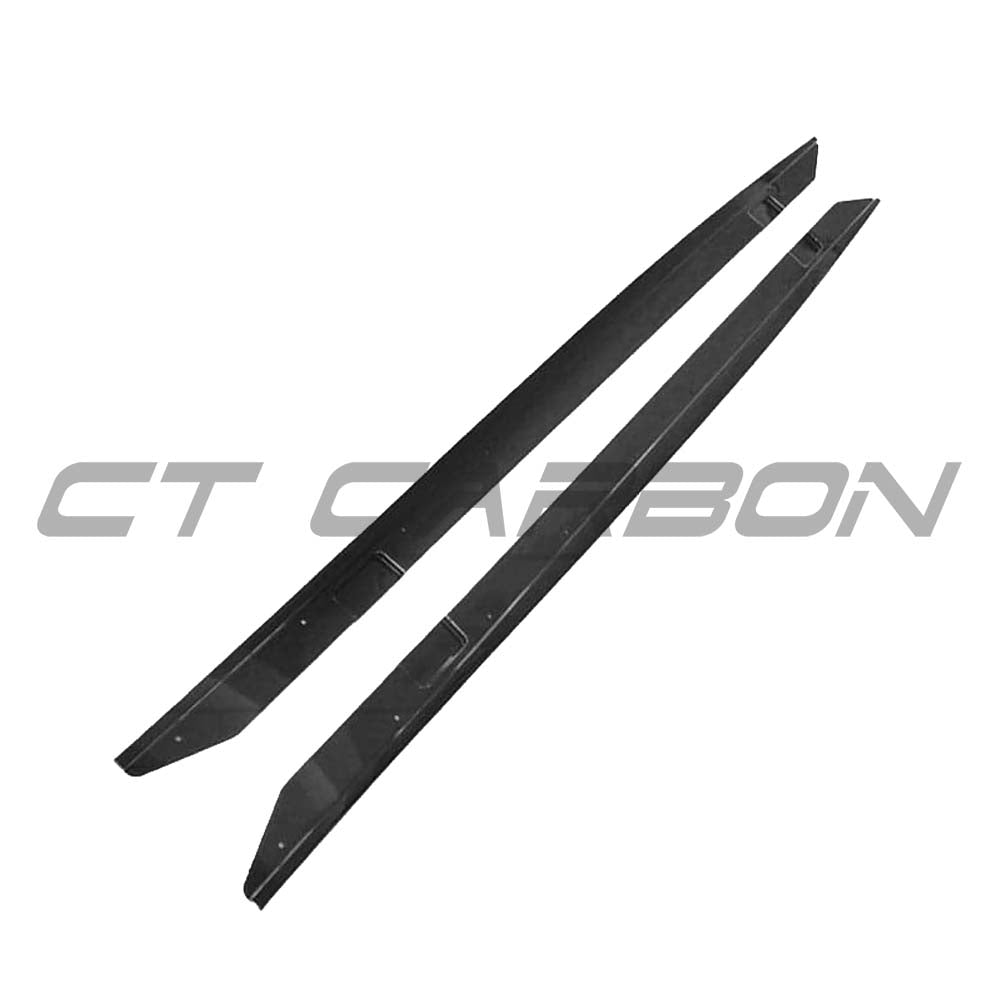 BMW 2 Series F22 F23 CT Carbon gloss black side skirts, MP style, with a sleek, aerodynamic design visible from the side view.