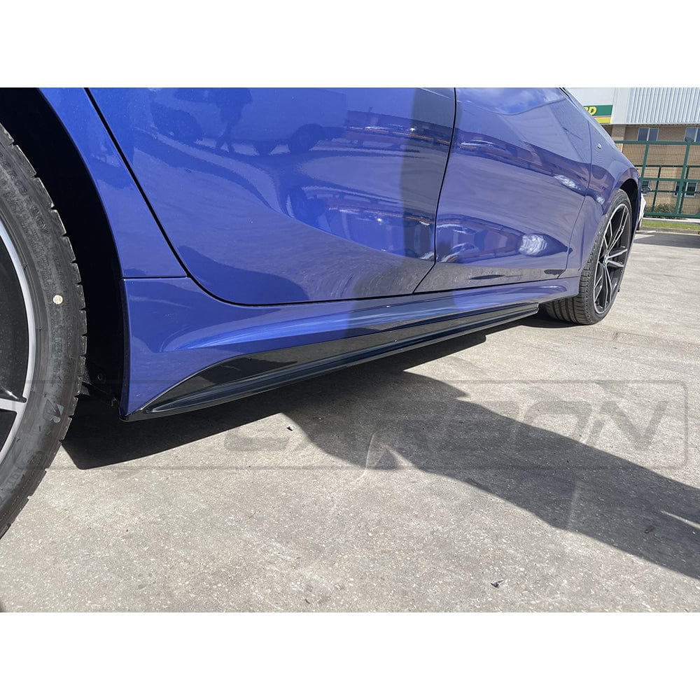 BMW 3 Series G20 G21 gloss black side skirts by CT Carbon, featuring a sleek MP style design on a vehicle side profile.