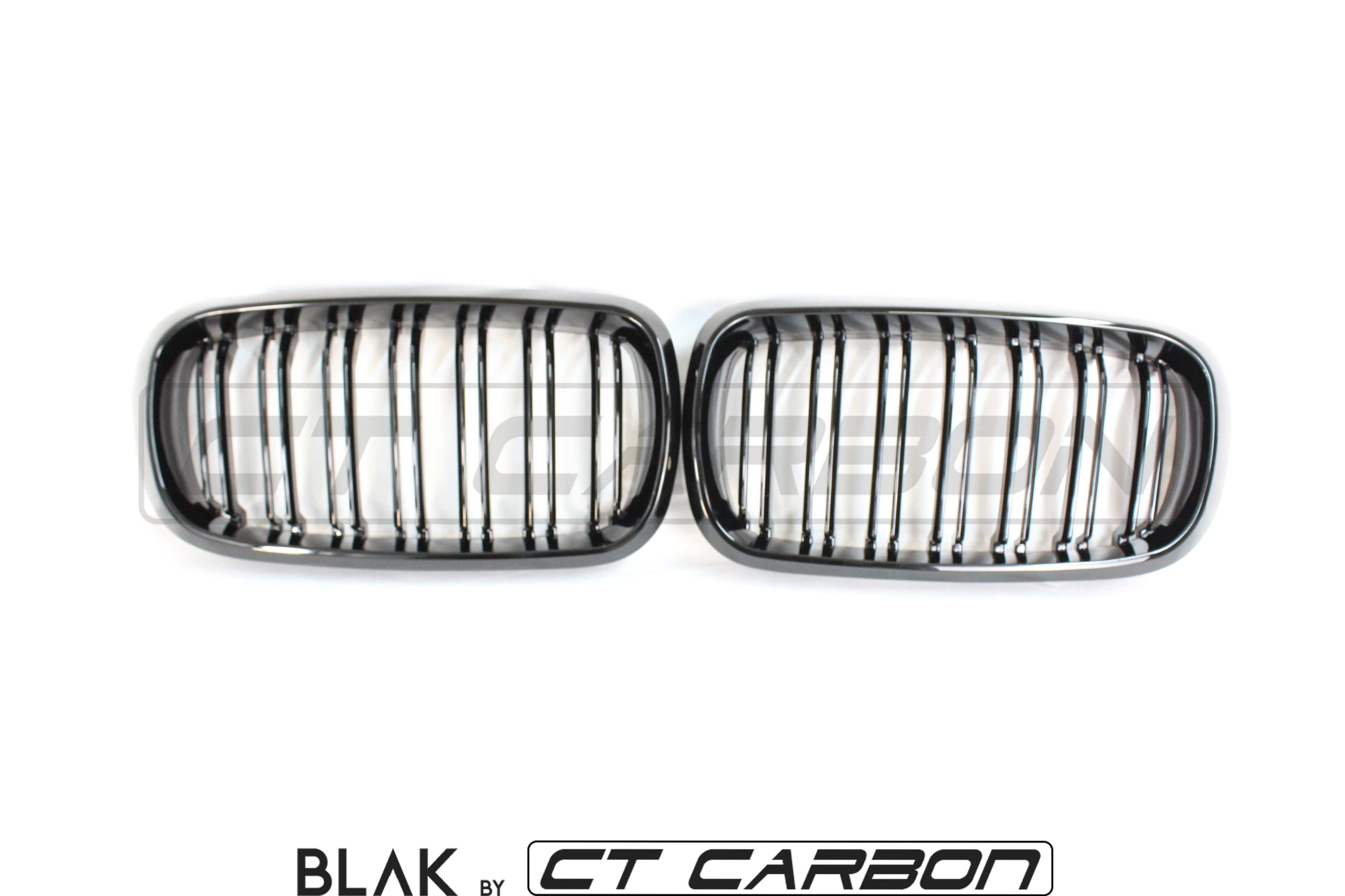 Black CT Carbon double slat grille for BMW X5M F15 and X6M F16 models, showcasing sleek, aggressive front-end styling.