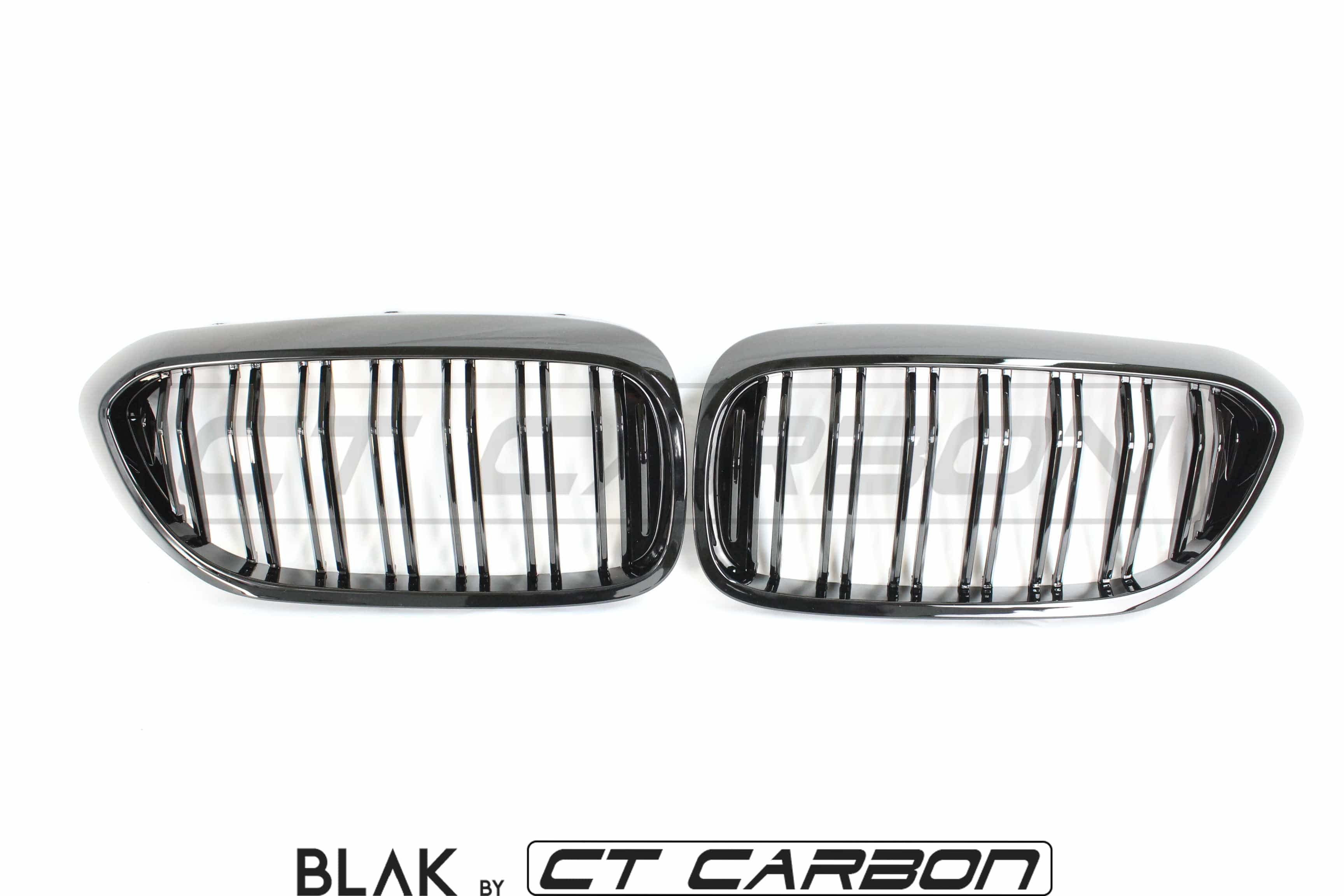 BMW M5 F90 and 5 Series G30 black double slat grille by CT Carbon, showcasing sleek black automotive grille design.
