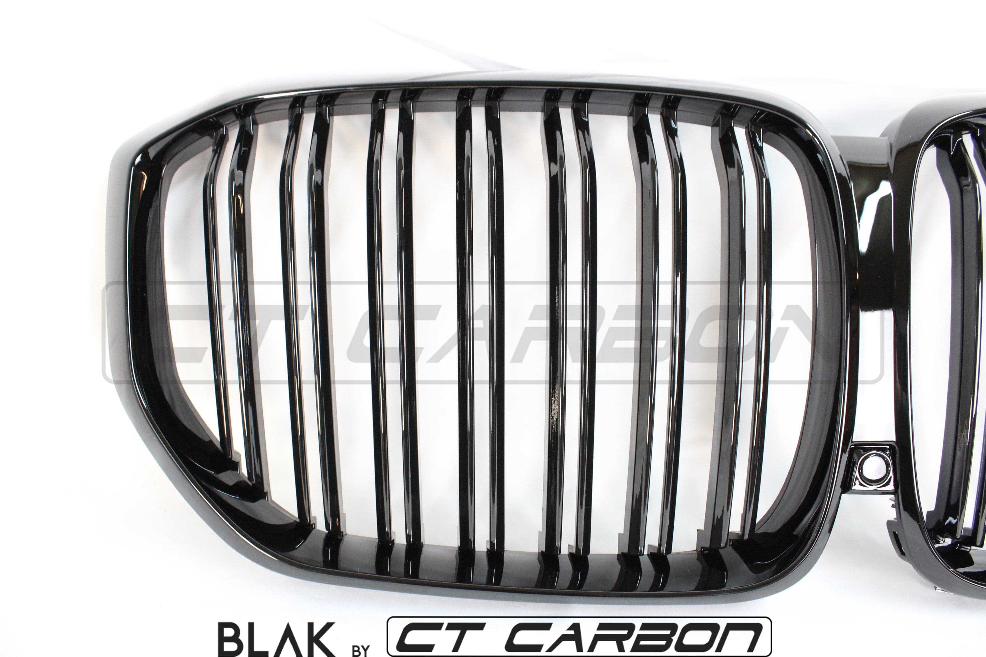 BMW X5 G05 2018+ CT Carbon double slat black grille showing sleek black finish and chrome accents on the grille slats.