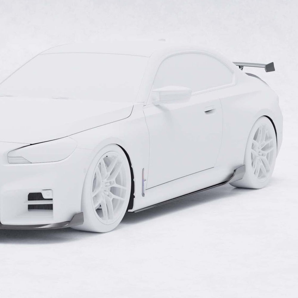 BMW G87 M2 TR87 pre-preg carbon fibre side skirts by TREVORA, showing sleek black aerodynamic side panels on the car.
