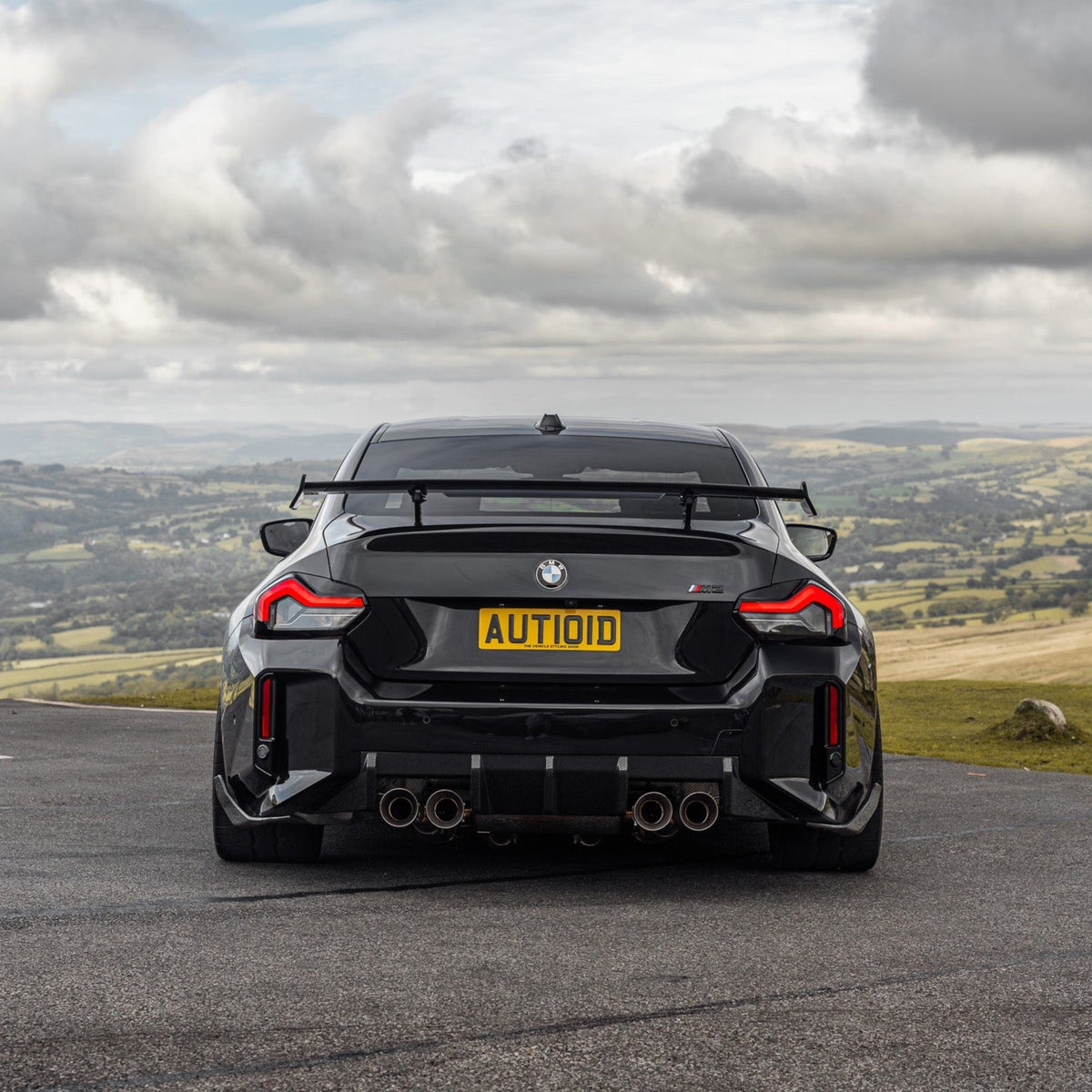 BMW G87 M2 TREVORA TR87 pre-preg carbon fibre front splitter with winglets, designed for 2023 model, enhances aerodynamics.