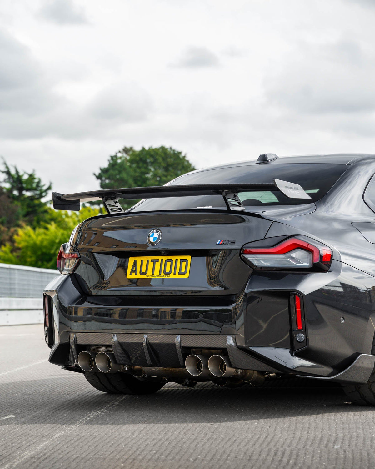 BMW M2 G87 and M240i G42 TREVORA carbon fibre rear wing spoiler, showcasing sleek aerodynamic design and lightweight construction.