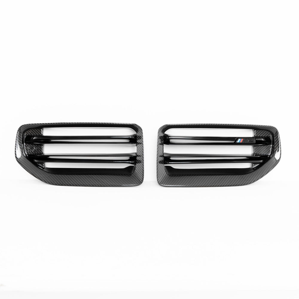 BMW M2 G87 front grille with pre-preg carbon fibre by TREVORA, showcasing the sleek, textured design for 2023-2024 models.