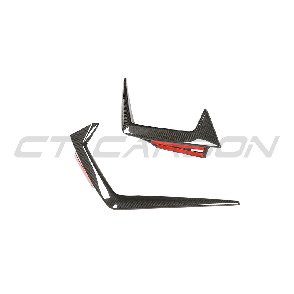 BMW G90 G99 M5 carbon fibre front bumper trim accessory by CT Carbon, showing close-up of sleek, lightweight design.