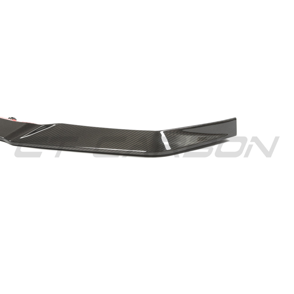 BMW G90 G99 M5 Carbon Fibre Splitter by CT Design, V1, showcasing sleek aerodynamic design on a sporty vehicle.