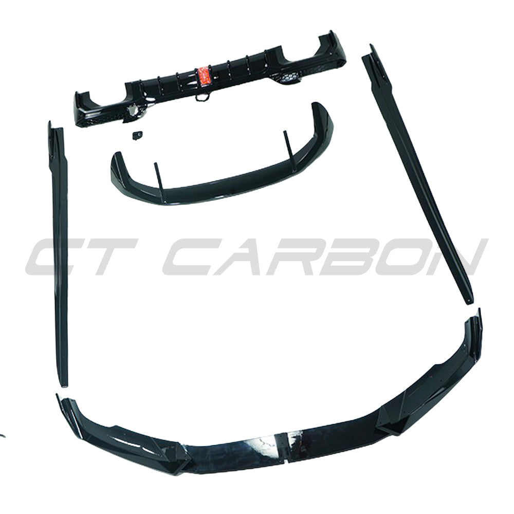 BMW X3 G01 and G08 2021-2024 full gloss black kit with tips by CT Carbon, featuring sleek black accents and chrome tips.
