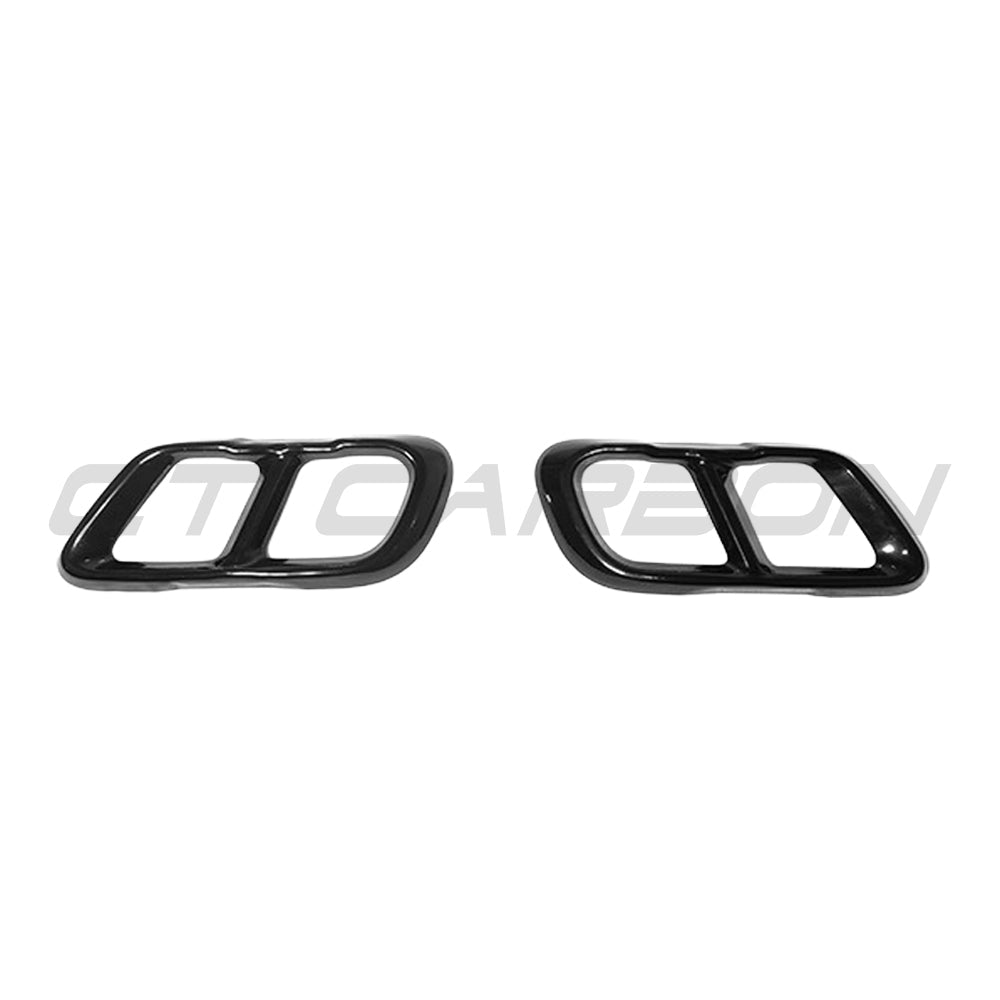 BMW X5 G05 2018+ Gloss Black Exhaust Tip Add-On by CT Carbon, showcasing sleek, polished exhaust tip accessory on vehicle.