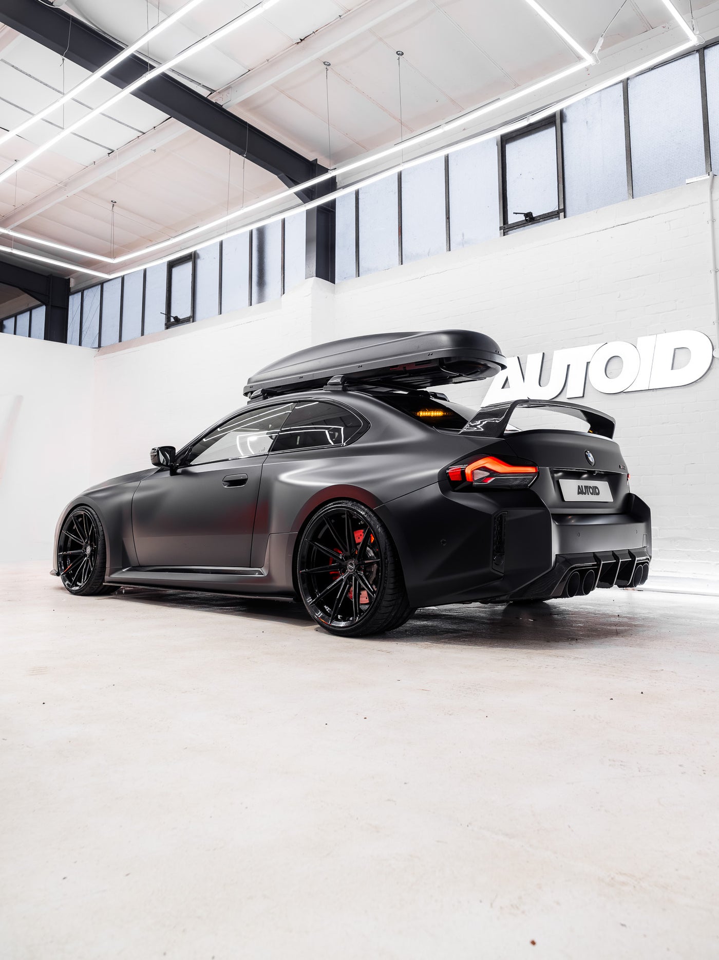 BMW M2 G87 rear diffuser made of pre-preg carbon fiber by TREVORA, showcasing a sleek, aerodynamic design for 2023+ models.