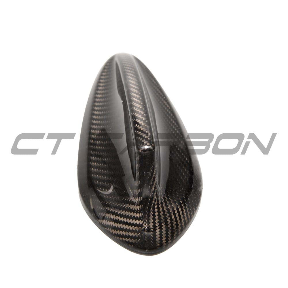 BMW Fxx carbon fibre antenna cover by CT Carbon, close-up of sleek black accessory on vehicle antenna.