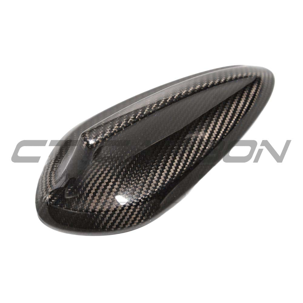 BMW Fxx carbon fibre antenna cover by CT Carbon, close-up of sleek black accessory for vehicle antenna enhancement.