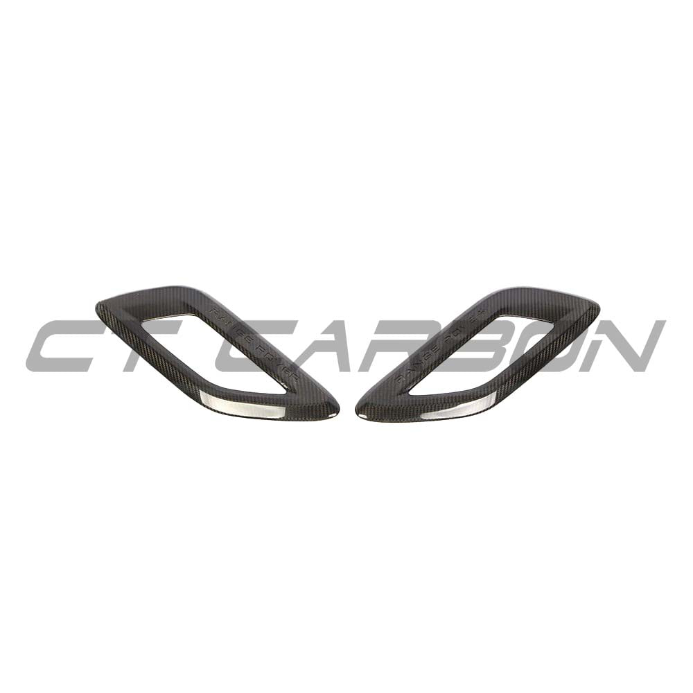 CT Carbon Range Rover Sport carbon fibre bonnet intake trim, close-up of sleek, textured carbon fibre accessory on vehicle engine bay.