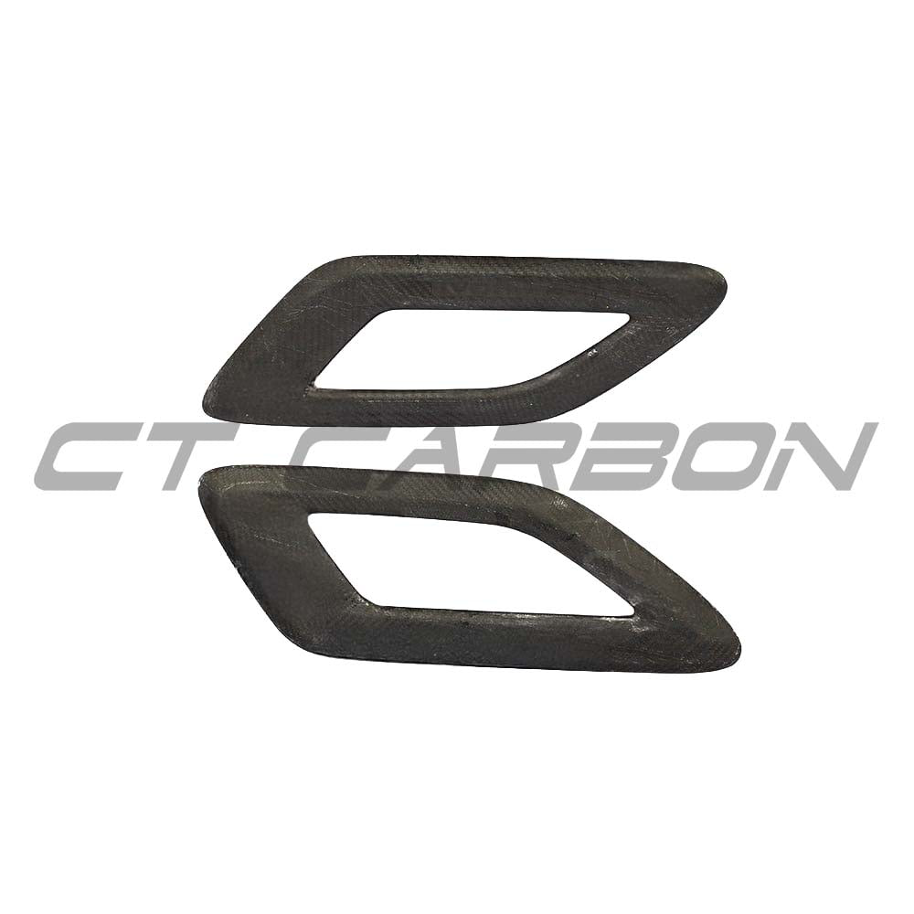 CT Carbon Range Rover Sport carbon fibre bonnet intake trim, close-up of sleek, textured carbon fibre accessory on vehicle's engine bay.