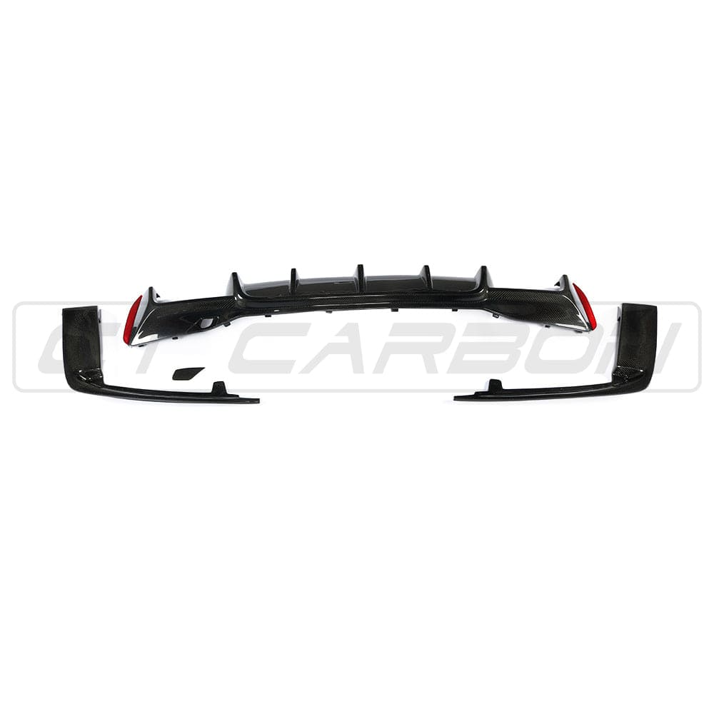 BMW F90 M5 CT Carbon fiber diffuser, V2 model, showcasing sleek 3D-style carbon fiber finish on a high-performance car.