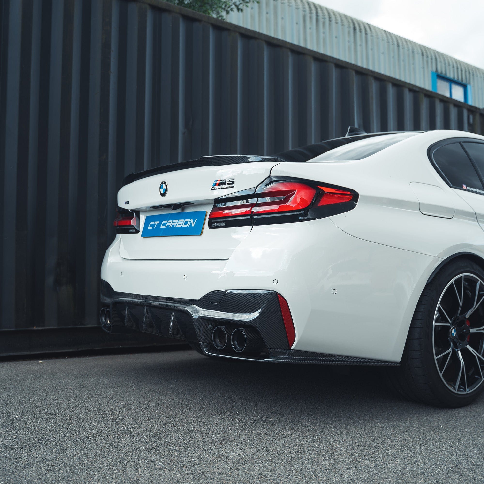 BMW F90 M5 CT Carbon fiber diffuser, V2, showcasing sleek carbon fiber design and 3D style for enhanced aerodynamics.
