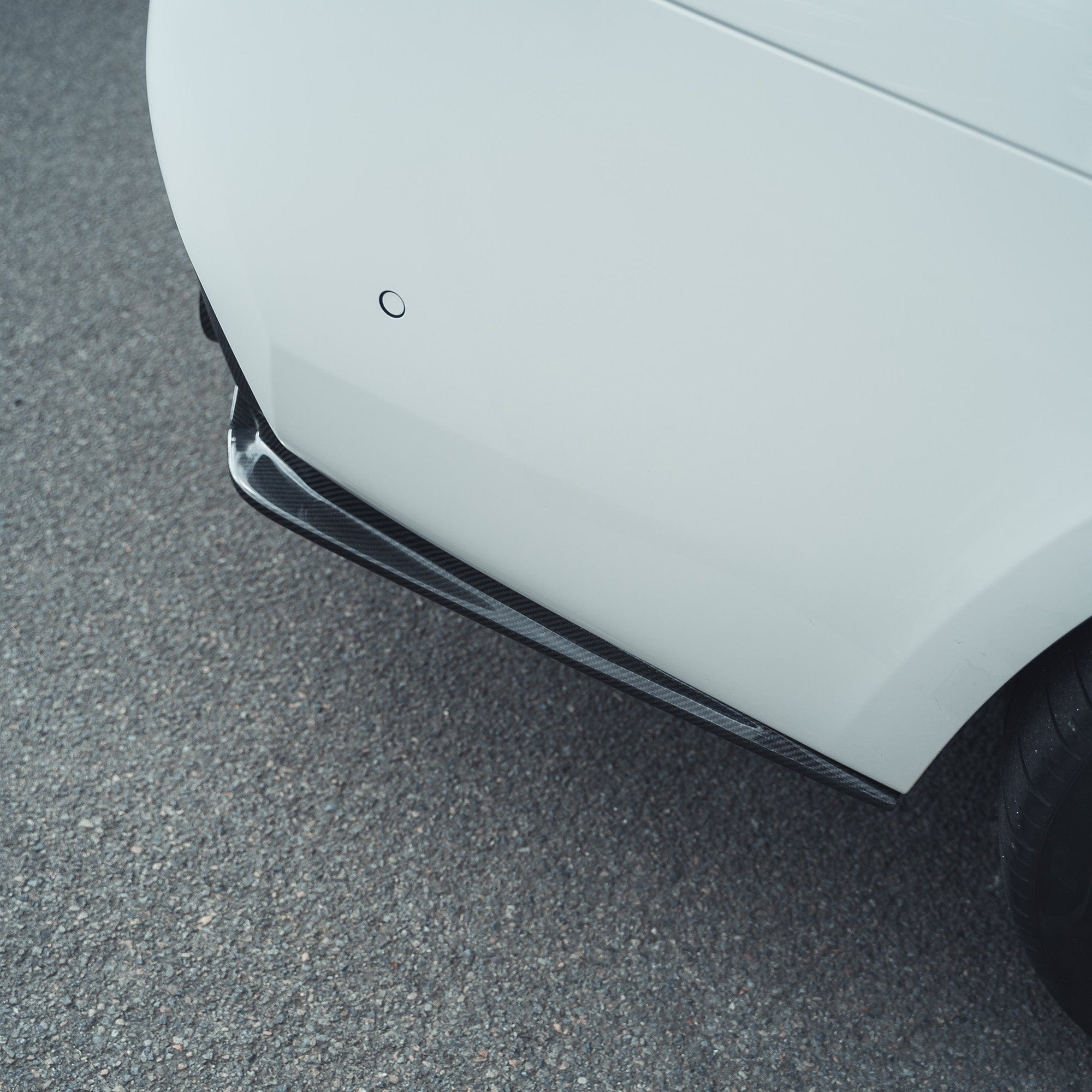 BMW F90 M5 CT Carbon V2 carbon fibre diffuser showcasing sleek, aerodynamic design and detailed craftsmanship.