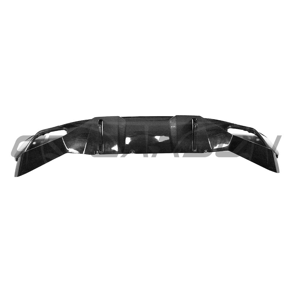 BMW G30 5 Series M Sport carbon fibre diffuser kit by CT Carbon, featuring sleek OEM-style carbon fiber design with vent details.