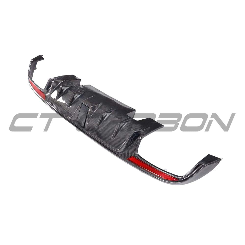 Mercedes W205 C63 S sedan carbon fiber diffuser with exhaust tips, designed by CT Carbon, showcasing sleek performance styling.