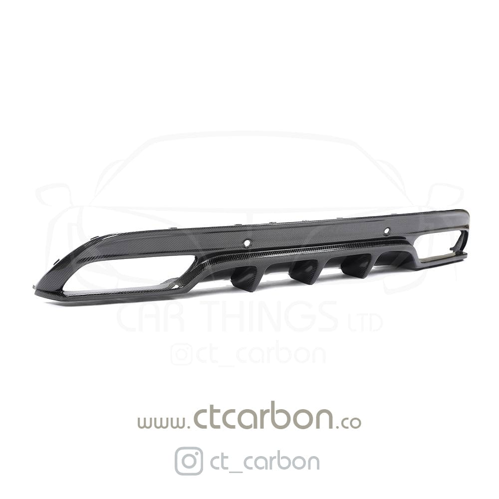 CT Carbon diffuser for Mercedes W205 C63 and C63S saloon, featuring carbon finish and integrated exhaust tips.