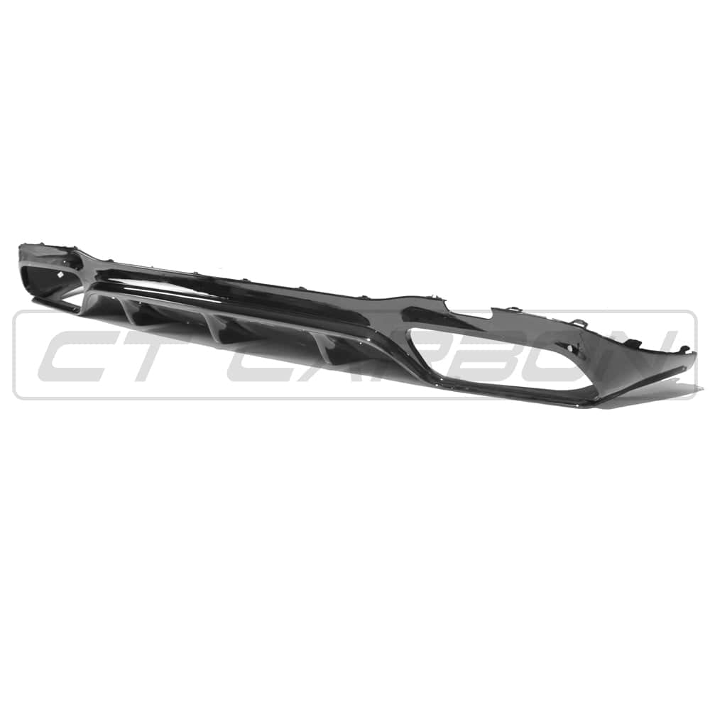 Gloss black Mercedes W213 E-Class diffuser and tips by CT Carbon, featuring sleek design and exhaust tips detail.