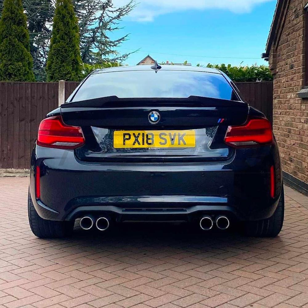 BMW F87 M2 CT Carbon full carbon fiber kit including body panels and accessories, showcasing a sleek, lightweight forged carbon fiber design.