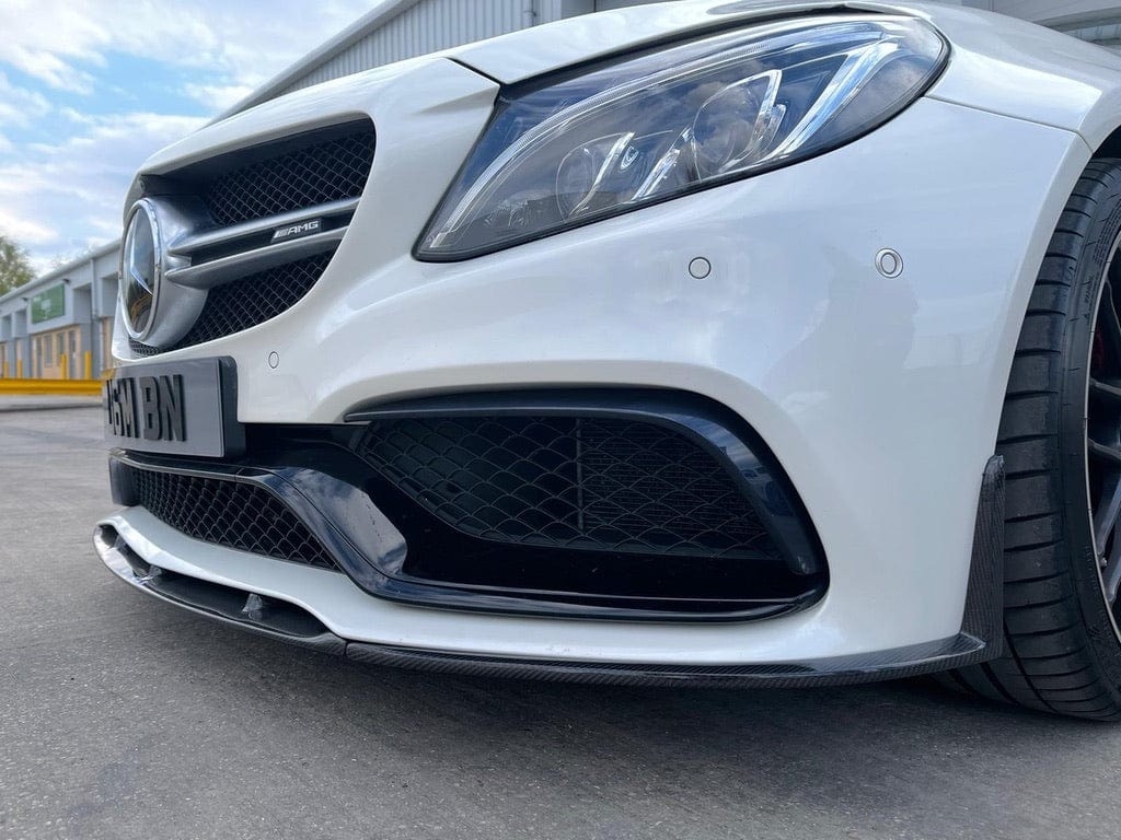 Full carbon fibre kit for Mercedes C63 W205 convertible by CT Carbon, showing detailed carbon fiber panels and components.