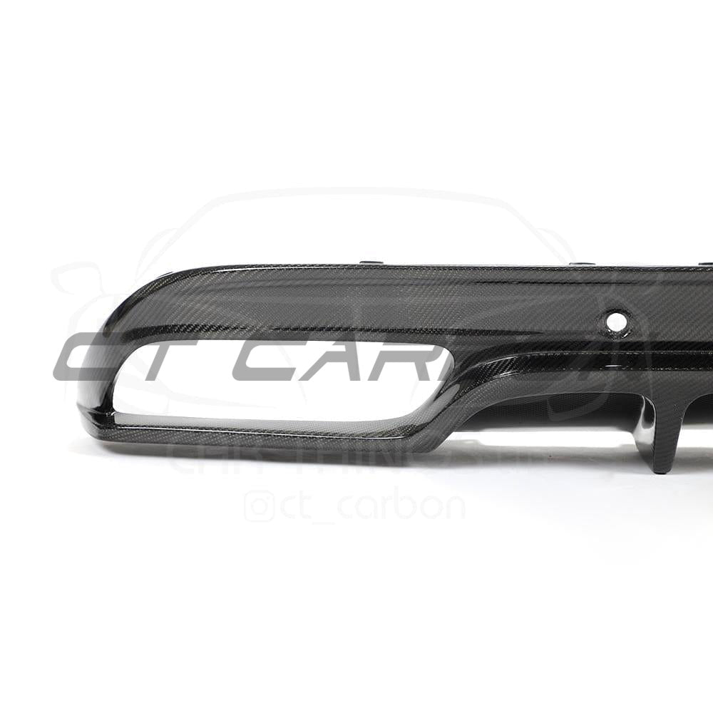 Full Mercedes C63 W205 saloon carbon fiber kit by CT Carbon, showing detailed carbon fiber panels and sleek styling elements.