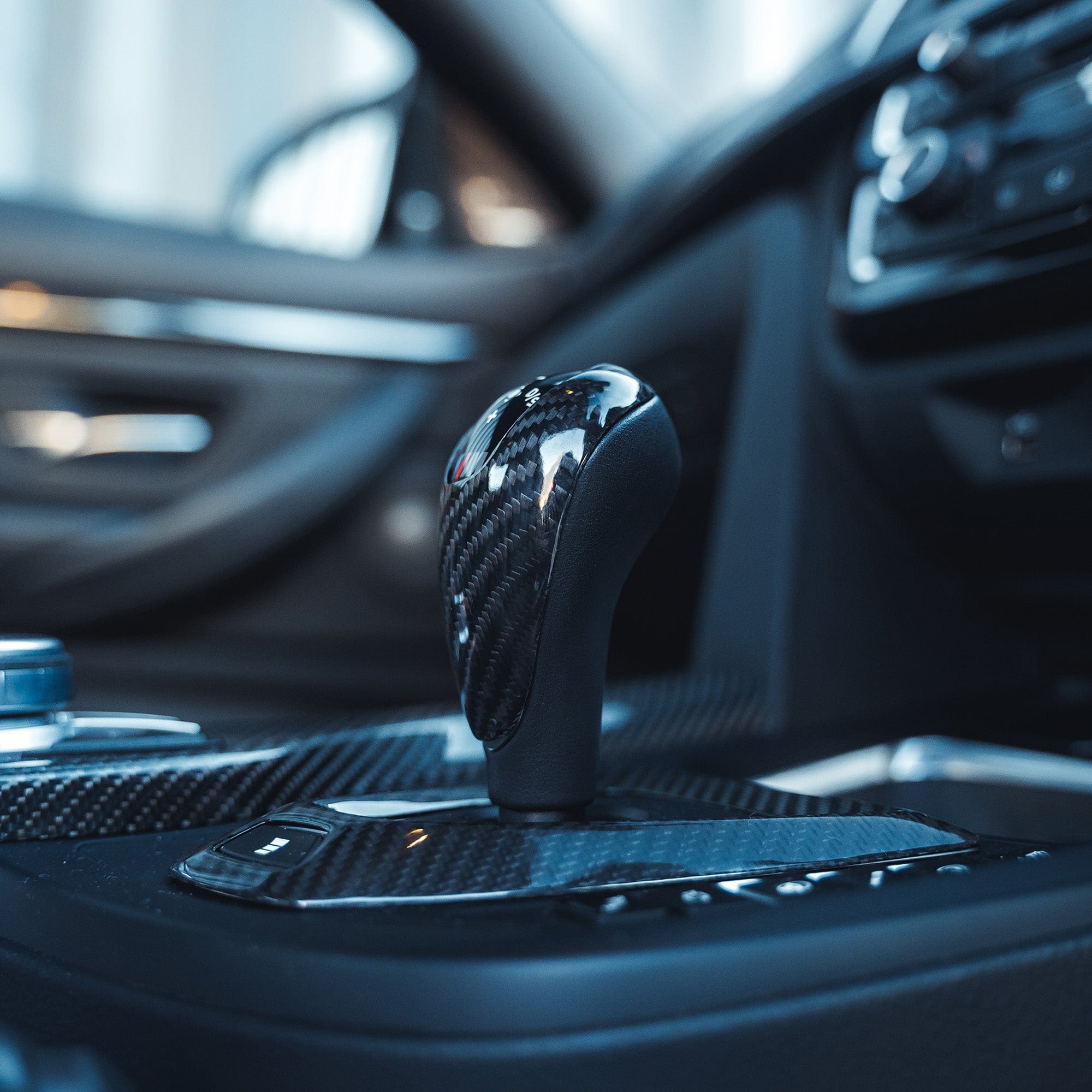 BMW FXX M car DCT shifter and surround set by CT Carbon, RHD interior accessories with carbon fiber finish.
