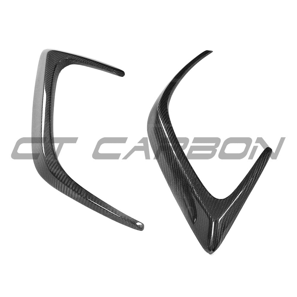 Carbon fibre rear bumper canards for Mercedes W205 C63 and C63S coupe, accessory by CT Carbon, shown attached to vehicle.