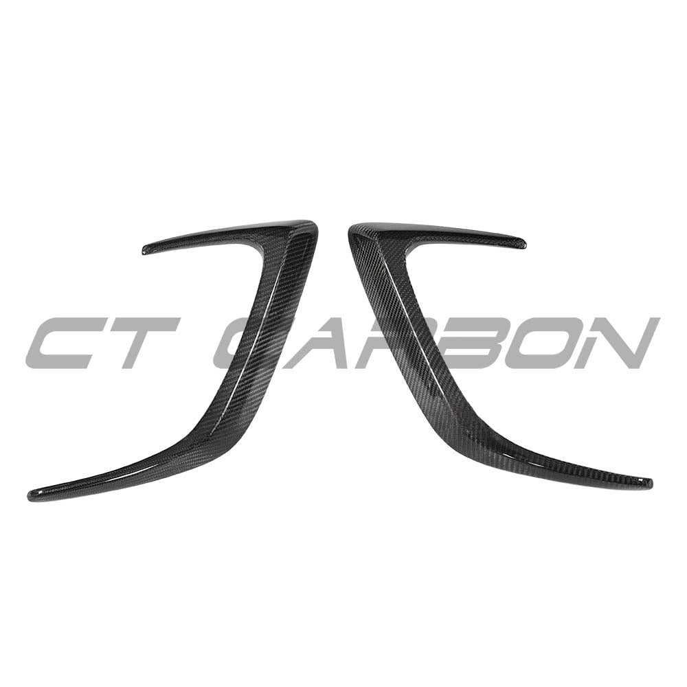 Carbon fiber rear bumper canards for Mercedes W205 C63 and C63S coupe, by CT Carbon, mounted on the car's rear bumper.