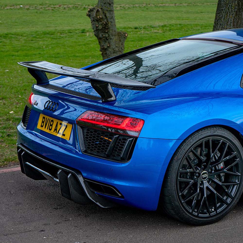 Carbon fiber rear wing spoiler for Audi R8 V10 Gen 2/2.5 by CT Carbon, V-style design, enhances aerodynamics and sporty appearance.