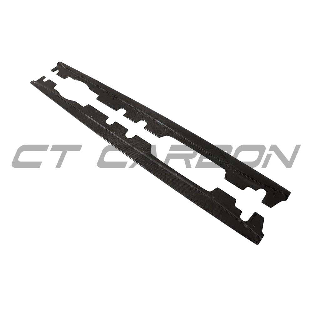 BMW M3 E92 carbon fibre side skirts by CT Carbon, showcasing sleek, lightweight automotive side skirts with a textured carbon fiber finish.