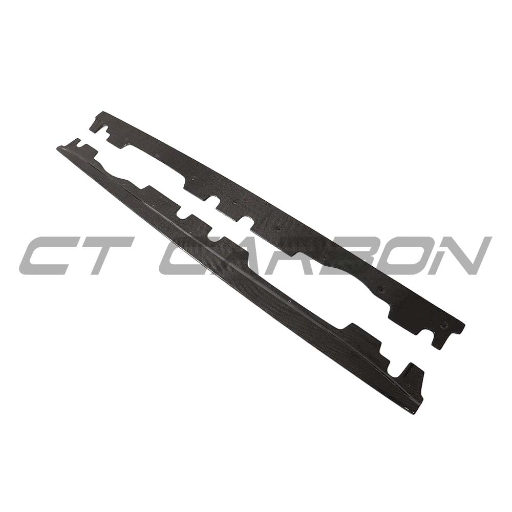 BMW M3 E92 carbon fibre side skirts by CT Carbon, showcasing sleek, lightweight automotive side skirts with a carbon fiber finish.