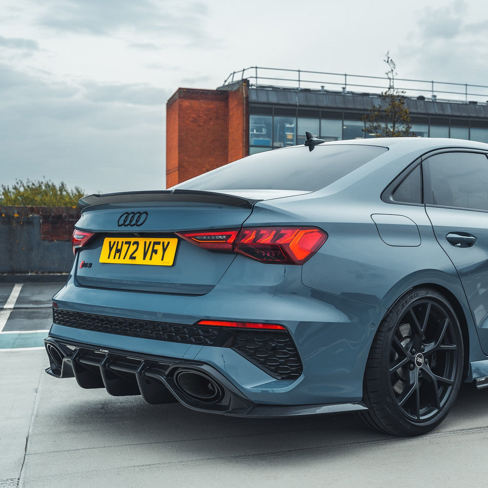 CT Carbon Audi RS3 8Y saloon car carbon fibre diffuser V1, showcasing sleek, textured carbon fiber design for sporty performance.