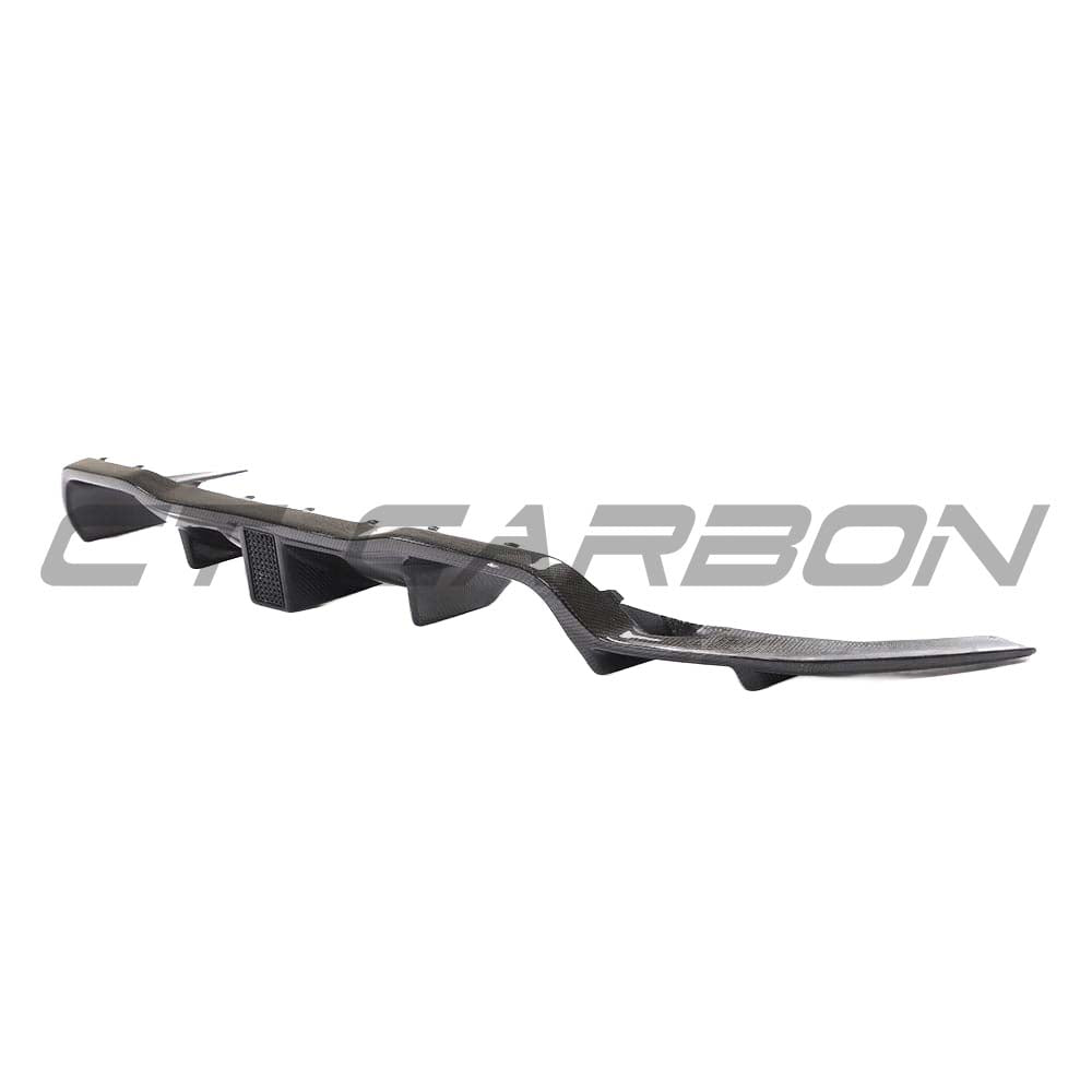 BMW F87 M2C Competition full carbon fiber kit by CT Carbon, featuring splitters and aerodynamic components on a sleek car.