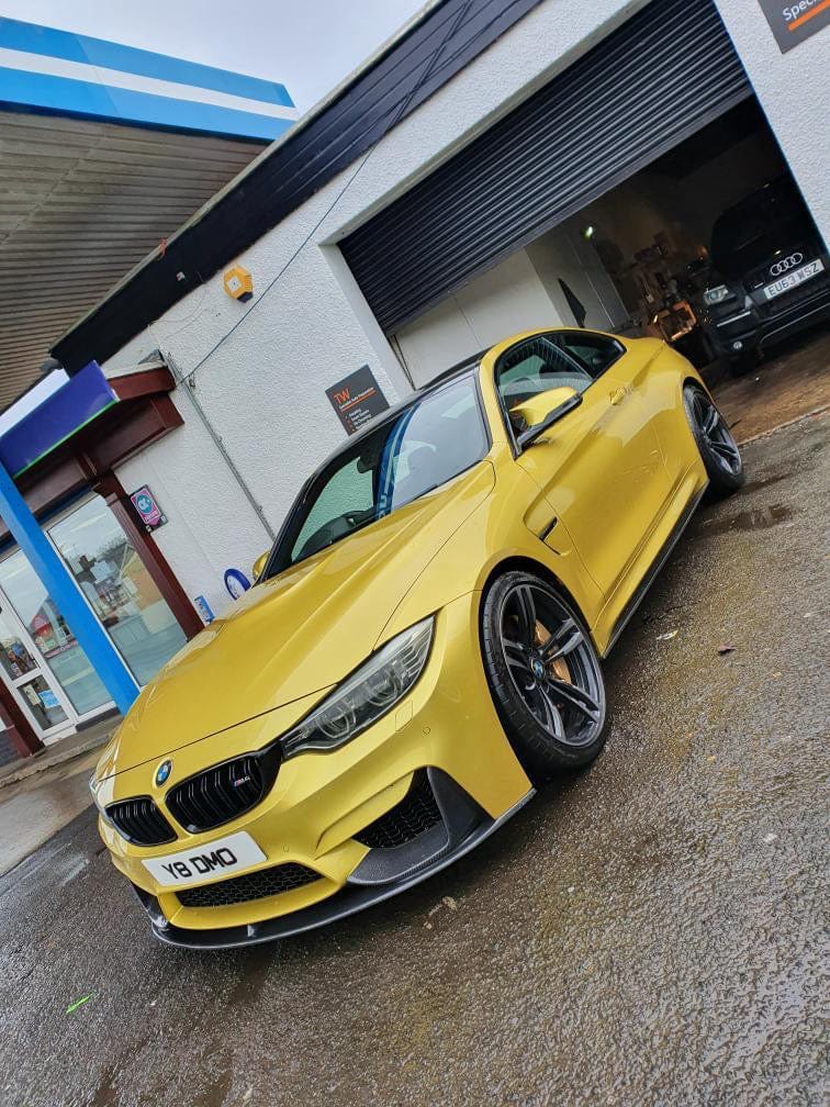 BMW M3 F80 full carbon fiber kit by CT Carbon, including splitter and body panels, showcasing sleek, high-quality carbon fiber components.